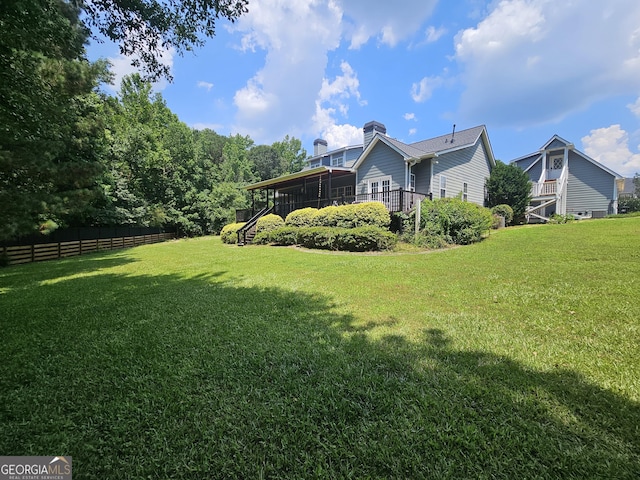 200 Chaparral Trce, Tyrone, GA 30290 - view of yard featuring a sunroom, stairway, and a deck