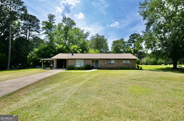 68 Archie Ln, Pine Mountain, GA 31822 - single story home with concrete driveway, a carport, a front lawn, brick siding, and view of scattered trees