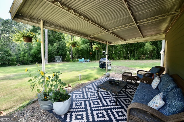 68 Archie Ln, Pine Mountain, GA 31822 - view of patio with a grill and view of wooded area