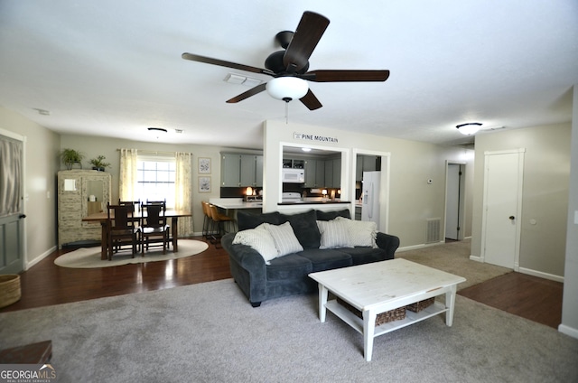 68 Archie Ln, Pine Mountain, GA 31822 - carpeted living area featuring a ceiling fan and wood finished floors