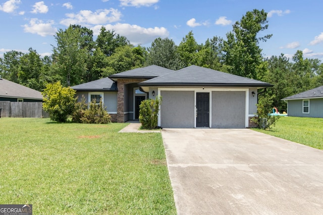 324 Woodbridge Rd, Kingsland, GA 31548 - view of front of property featuring stucco siding and driveway