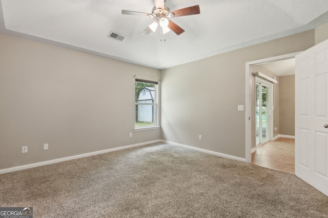 324 Woodbridge Rd, Kingsland, GA 31548 - unfurnished room featuring carpet floors, ceiling fan, and vaulted ceiling