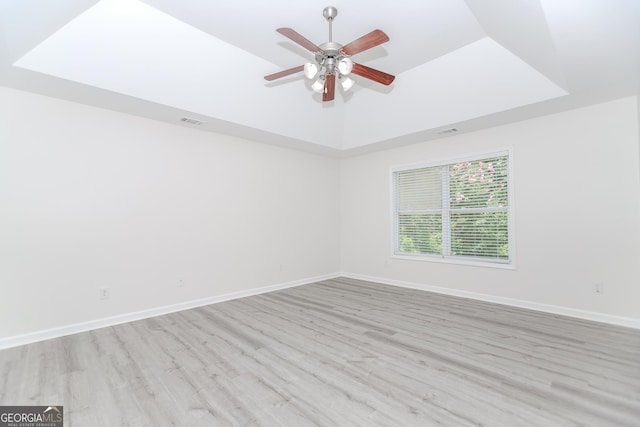 2023 Jameson Cir, Lawrenceville, GA 30043 - unfurnished room with ceiling fan, wood finished floors, and vaulted ceiling