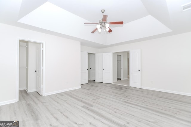 2023 Jameson Cir, Lawrenceville, GA 30043 - unfurnished bedroom featuring light wood-type flooring and ceiling fan