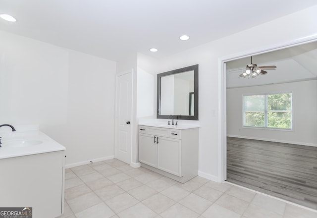 2023 Jameson Cir, Lawrenceville, GA 30043 - bathroom with two vanities, tile patterned floors, recessed lighting, and ceiling fan