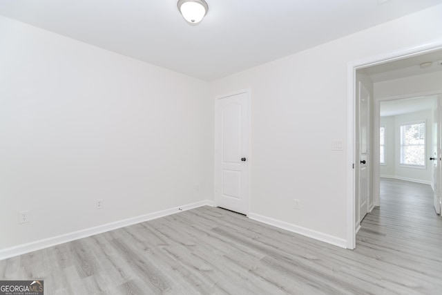 2023 Jameson Cir, Lawrenceville, GA 30043 - unfurnished room featuring wood finished floors and baseboards