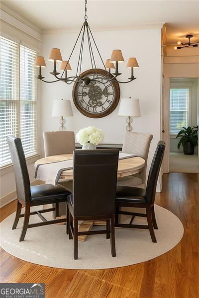 730 Midway, Canton, GA 30114 - dining room featuring a chandelier, ornamental molding, and wood finished floors