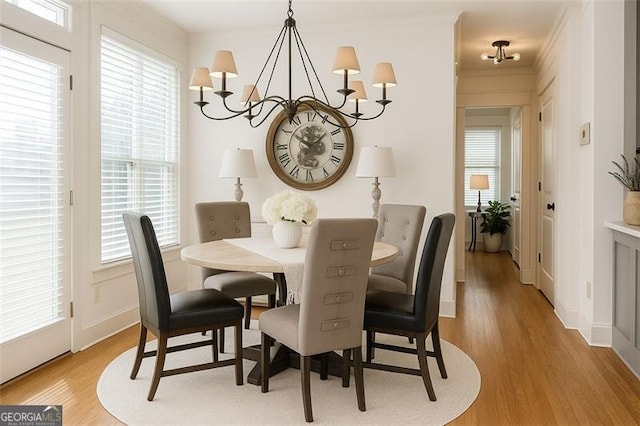 730 Midway, Canton, GA 30114 - dining room with a chandelier, light wood-style flooring, and ornamental molding
