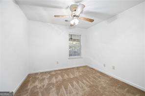 4527 Baker Grove Rd NW, Acworth, GA 30101 - unfurnished room featuring carpet floors and baseboards
