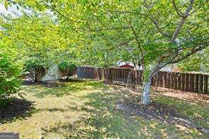 4527 Baker Grove Rd NW, Acworth, GA 30101 - view of fenced backyard
