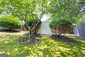 4527 Baker Grove Rd NW, Acworth, GA 30101 - view of yard featuring a storage shed