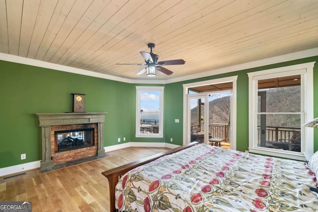 1043 Deer Run Rdg, Jasper, GA 30143 - bedroom with access to exterior, a high end fireplace, wooden ceiling, wood finished floors, and crown molding