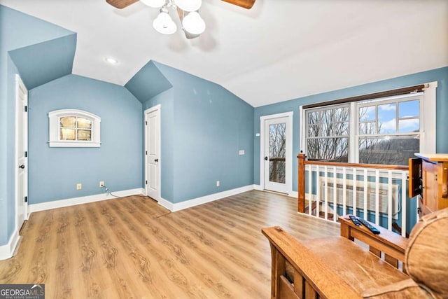 1043 Deer Run Rdg, Jasper, GA 30143 - additional living space with a ceiling fan, lofted ceiling, light wood finished floors, and radiator heating unit