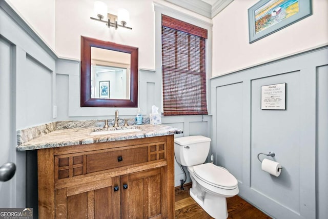 1043 Deer Run Rdg, Jasper, GA 30143 - bathroom featuring vanity, a decorative wall, wood finished floors, and wainscoting