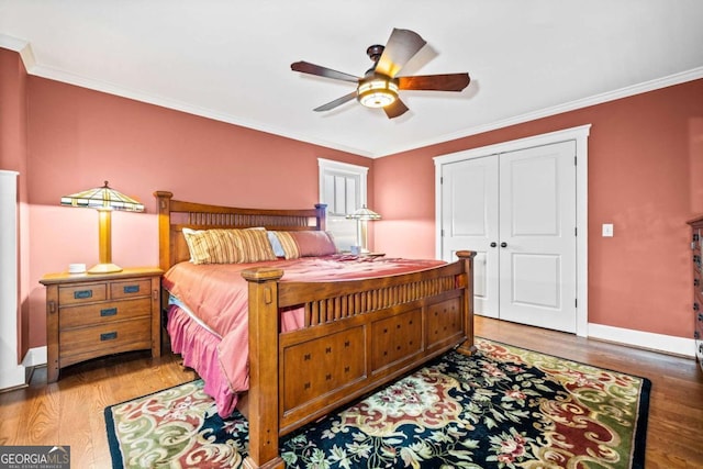 1043 Deer Run Rdg, Jasper, GA 30143 - bedroom with wood finished floors, ornamental molding, a closet, and ceiling fan