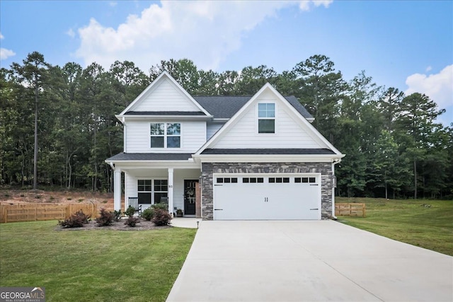 93 Oakdale Way, Temple, GA 30179 - view of front of property featuring a porch, concrete driveway, a garage, and stone siding