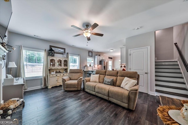 93 Oakdale Way, Temple, GA 30179 - living room with a ceiling fan, stairway, and dark wood-style flooring