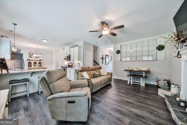 93 Oakdale Way, Temple, GA 30179 - living area featuring a ceiling fan, dark wood-type flooring, and a chandelier