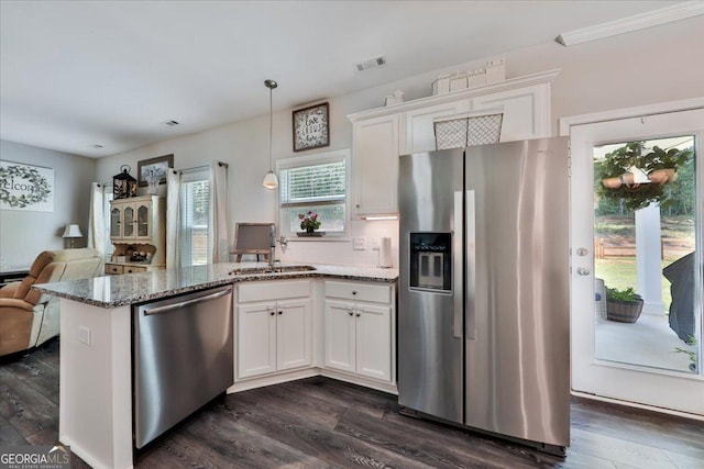 93 Oakdale Way, Temple, GA 30179 - kitchen with appliances with stainless steel finishes, open floor plan, light stone countertops, and white cabinets