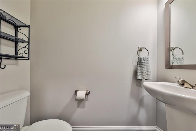 93 Oakdale Way, Temple, GA 30179 - half bathroom featuring toilet and a sink