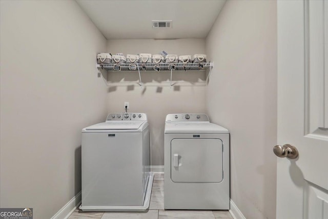 93 Oakdale Way, Temple, GA 30179 - washroom featuring washer and clothes dryer and baseboards