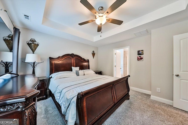93 Oakdale Way, Temple, GA 30179 - bedroom with light carpet, a raised ceiling, and ceiling fan