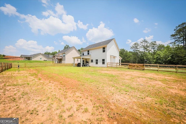 93 Oakdale Way, Temple, GA 30179 - rear view of house with a fenced backyard