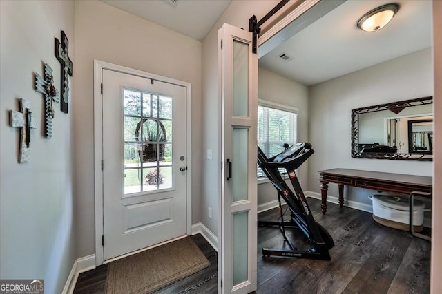 93 Oakdale Way, Temple, GA 30179 - entrance foyer featuring dark wood finished floors and a barn door