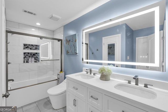 499 Running Doe Ct, Suwanee, GA 30024 - bathroom featuring double vanity and shower / bath combination with glass door
