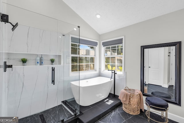 499 Running Doe Ct, Suwanee, GA 30024 - full bathroom with marble finish flooring, lofted ceiling, a freestanding tub, and a marble finish shower