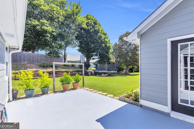 499 Running Doe Ct, Suwanee, GA 30024 - view of patio / terrace featuring a trampoline