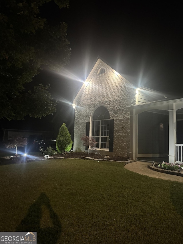 499 Running Doe Ct, Suwanee, GA 30024 - view of front facade featuring a yard