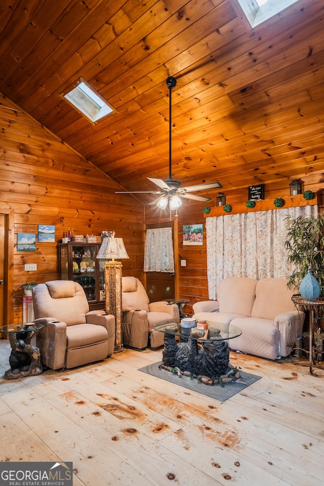 12 Scott Dr, Ellijay, GA 30540 - living room with a skylight, lofted ceiling, wood-type flooring, wooden walls, and wooden ceiling