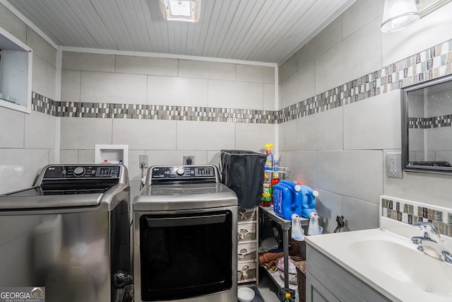 12 Scott Dr, Ellijay, GA 30540 - laundry room with tile walls and separate washer and dryer