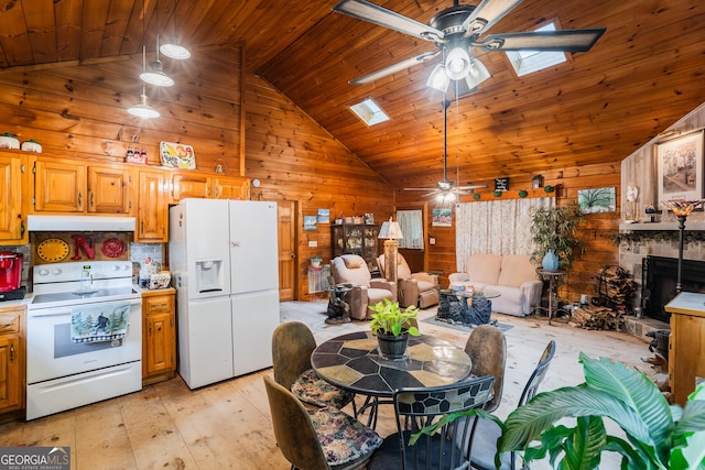 12 Scott Dr, Ellijay, GA 30540 - kitchen with white appliances, ceiling fan, wood walls, wooden ceiling, and light wood-style floors