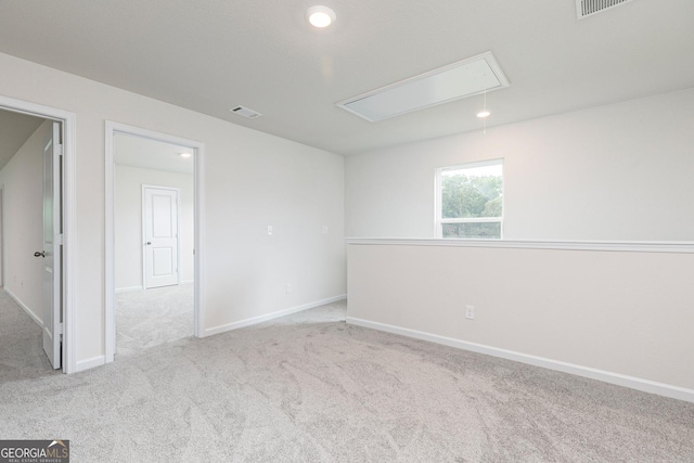 102 Avondale Blvd, Conyers, GA 30013 - carpeted empty room with attic access and recessed lighting