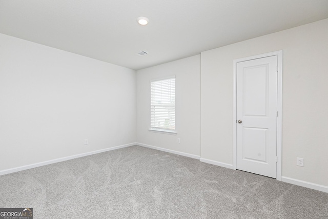 102 Avondale Blvd, Conyers, GA 30013 - unfurnished bedroom with carpet and baseboards