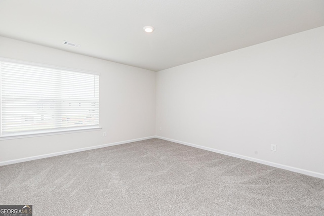 102 Avondale Blvd, Conyers, GA 30013 - spare room featuring carpet and recessed lighting