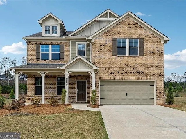 8415 Halford Way, Ball Ground, GA 30107 - view of front of home with an attached garage, concrete driveway, and brick siding