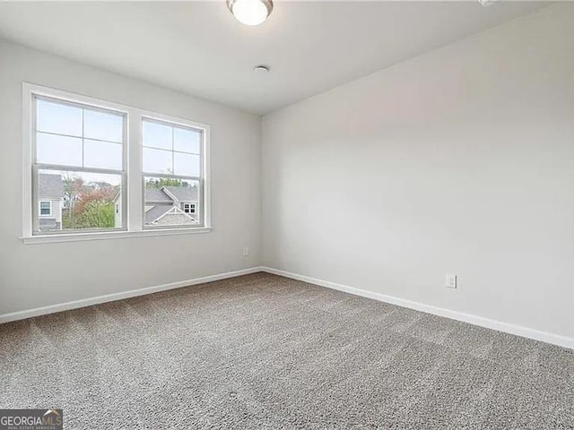 8415 Halford Way, Ball Ground, GA 30107 - carpeted spare room with baseboards