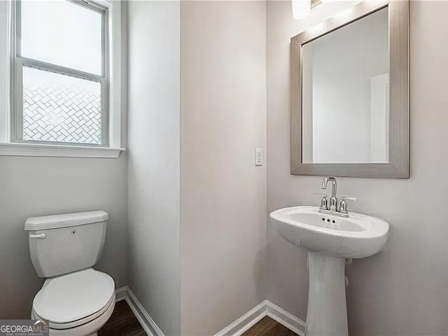 8415 Halford Way, Ball Ground, GA 30107 - bathroom featuring toilet and baseboards