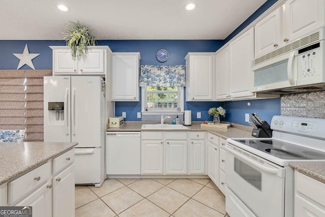 21 Hardwood Forest Cir, Brunswick, GA 31525 - kitchen with white appliances, white cabinets, light countertops, light tile patterned floors, and recessed lighting