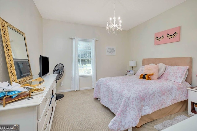 21 Hardwood Forest Cir, Brunswick, GA 31525 - bedroom with light colored carpet and a chandelier