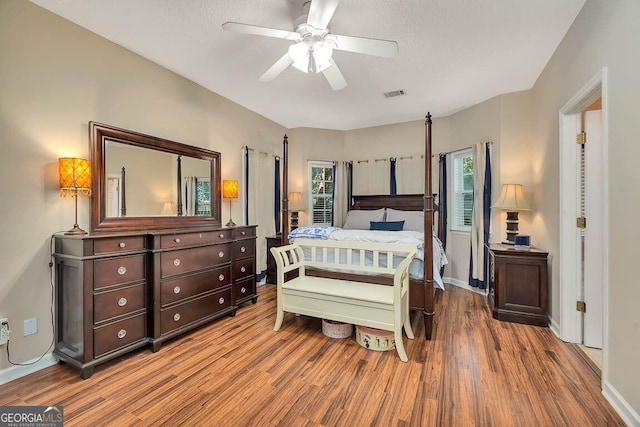 21 Hardwood Forest Cir, Brunswick, GA 31525 - bedroom with wood finished floors and a ceiling fan