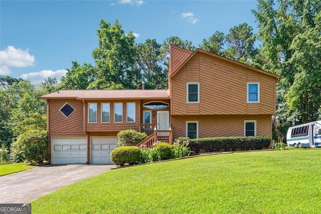 1159 Midland Dr NW, Acworth, GA 30102 - split level home featuring an attached garage, a front lawn, and driveway