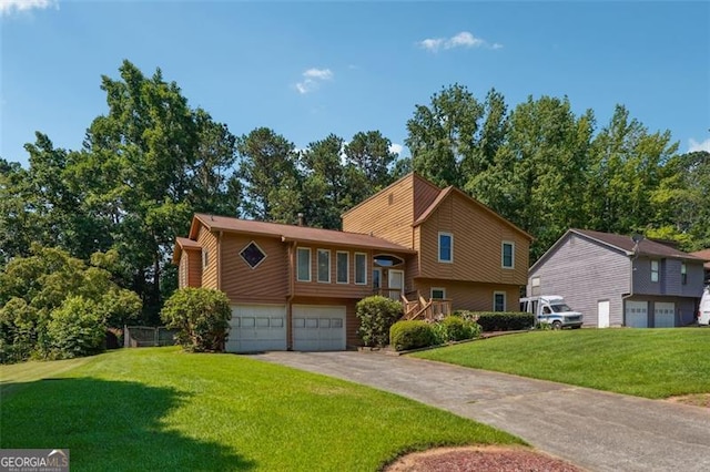 1159 Midland Dr NW, Acworth, GA 30102 - tri-level home featuring a garage, driveway, and a front yard