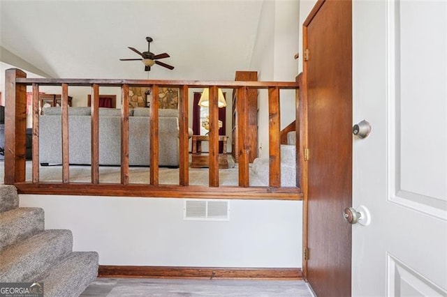 1159 Midland Dr NW, Acworth, GA 30102 - staircase featuring a ceiling fan and wood finished floors