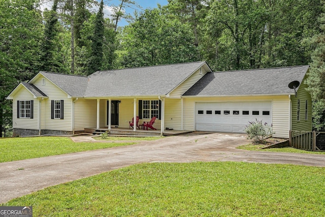 150 Buck Run E, Dahlonega, GA 30533 - single story home featuring concrete driveway, covered porch, an attached garage, a shingled roof, and a front yard
