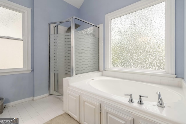 539 Riverbirch Trce, Stone Mountain, GA 30087 - bathroom with a stall shower and a bath