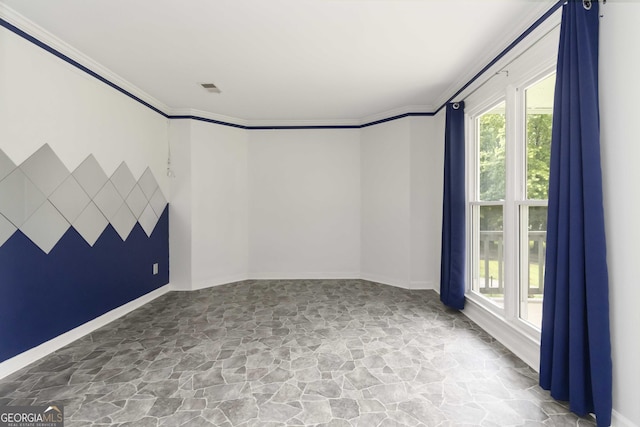539 Riverbirch Trce, Stone Mountain, GA 30087 - unfurnished room featuring stone floors, plenty of natural light, and crown molding
